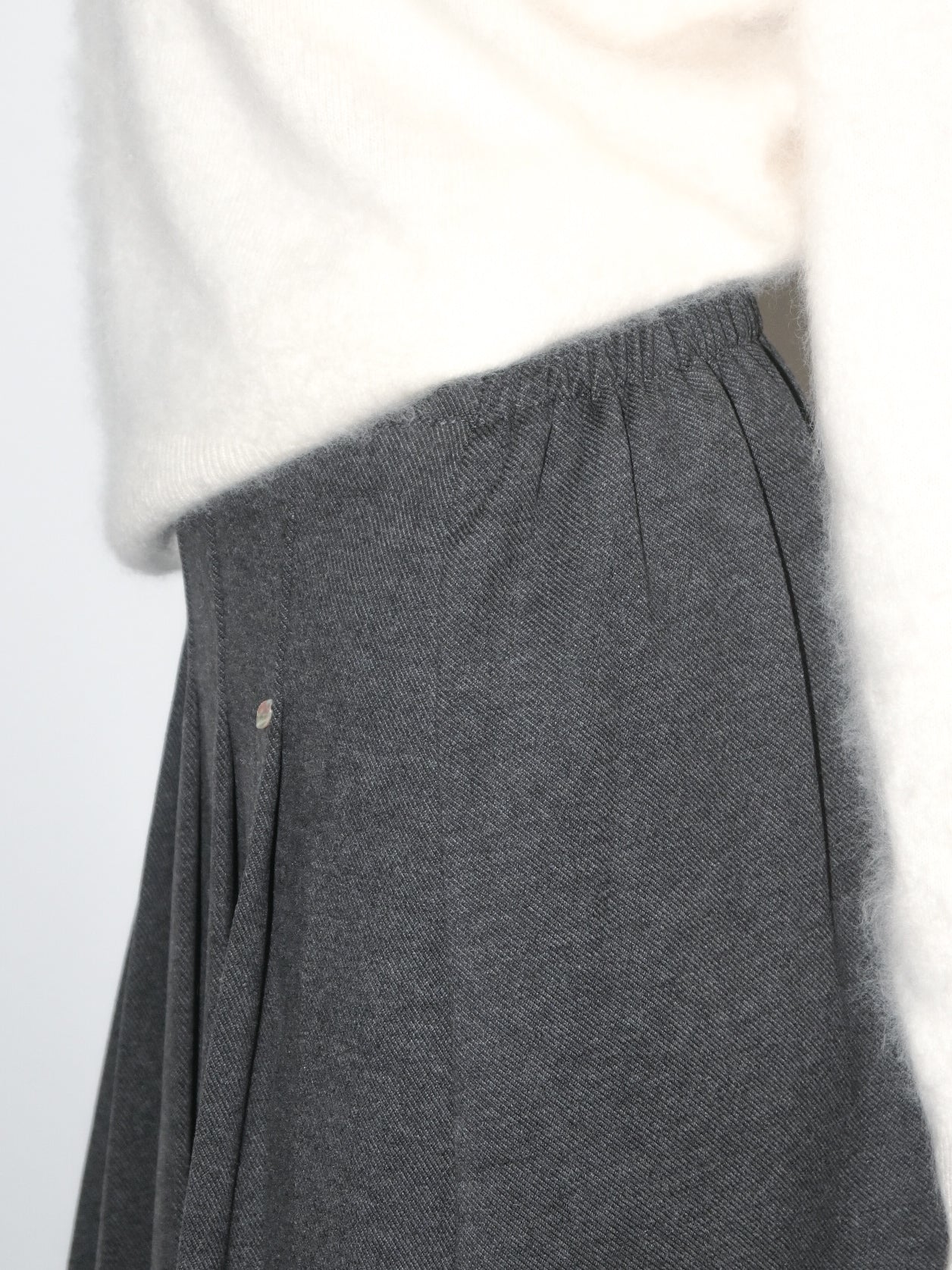 Pleated Asymmetric Midi Skirt